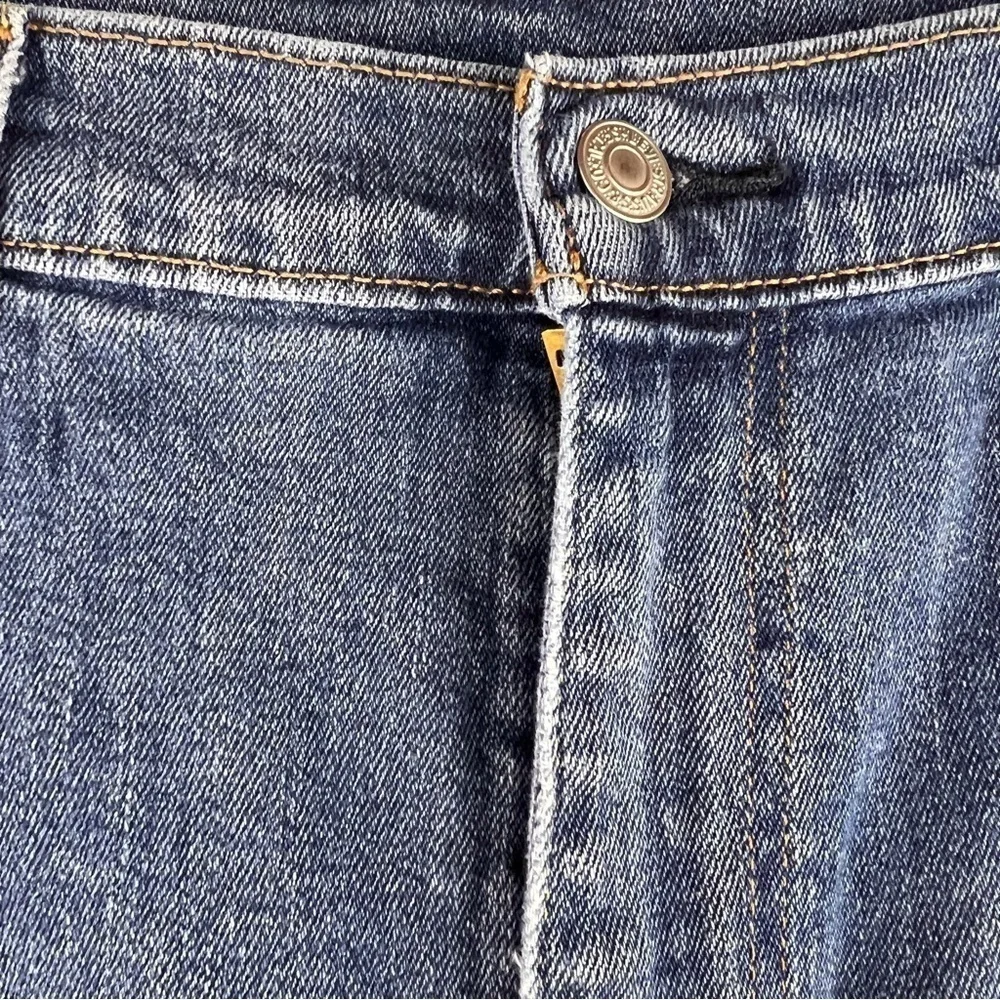 LEVI’S 550 JEANS. Great used condition. Size 38/32. Medium Wash. Frayed hems